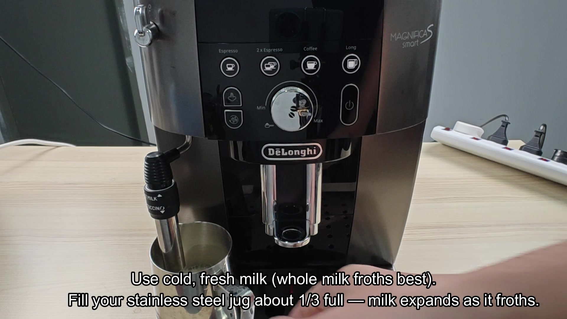 frothing-milk-on-the-de-longhi-magnifica-wand-position-question-1.jpg