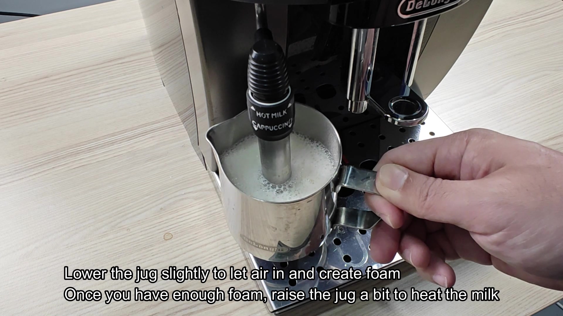 frothing-milk-on-the-de-longhi-magnifica-wand-position-question-2.jpg